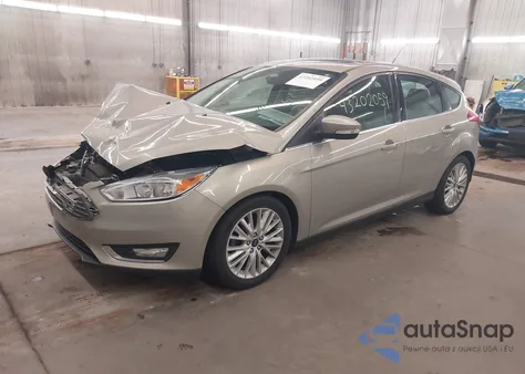 2016 Ford Focus Titanium z USA, uszkodzony, nr VIN 1FADP3N28GL326197